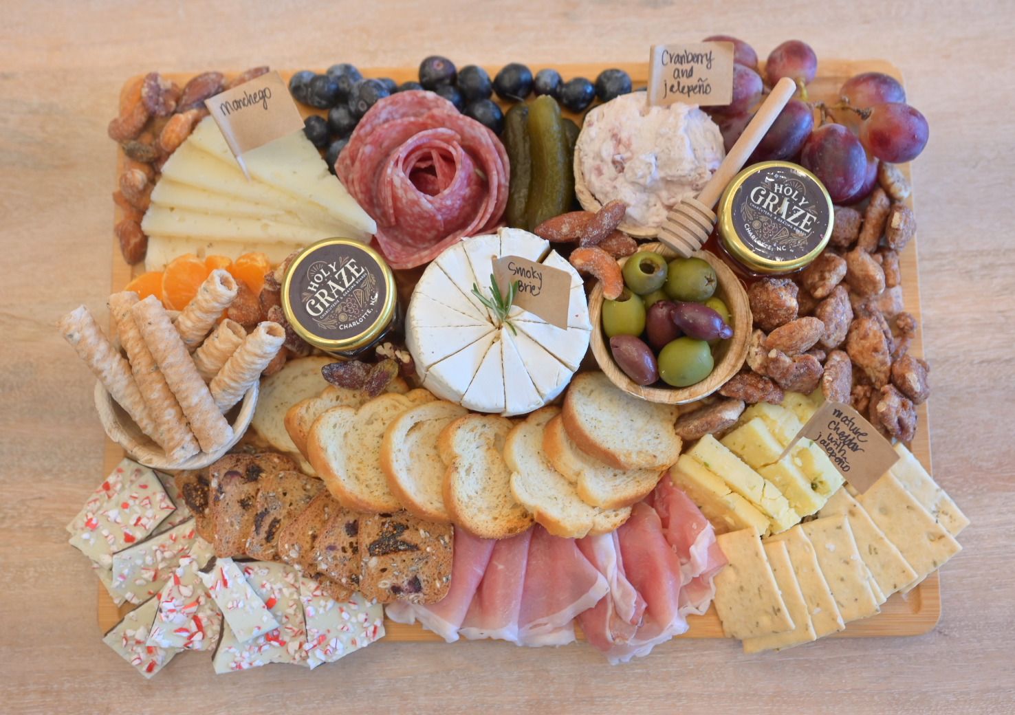 Medium charcuterie board perfect for 6-8 people.